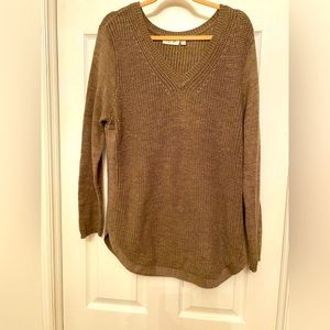 Brown vneck sweater with rounded bottom